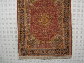 A contemporary Persian style pink ground and floral pattern Belgian cotton rug 68" x 49"