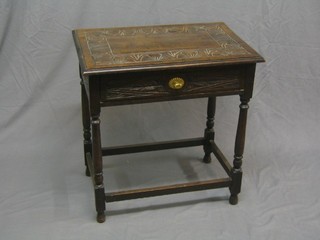 A Victorian rectangular carved oak occasional table fitted a drawer, raised on turned and block supports 27"
