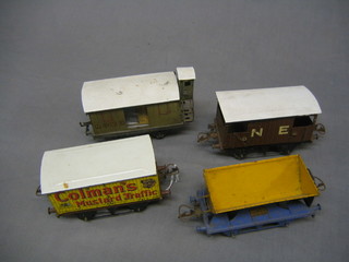 A Hornby Series Colman's Mustard wagon, a North Eastern Railways break wagon, a Nord break wagon (doors f) and a Sir Robert McAlpine side tipping truck