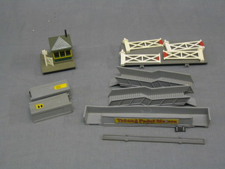 A Triang O gauge foot bridge R71, a Triang O gauge level crossing R70 and a Triang O gauge gate keepers hut R72, all boxed
