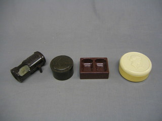 A white Bakelite circular dressing table jar decorated a portrait of Diana, 4" and a circular brown Bakelite jar and cover 3", a tray marked Made in England and a brown Bakelite Timothy White Rotosan automatic air purifier