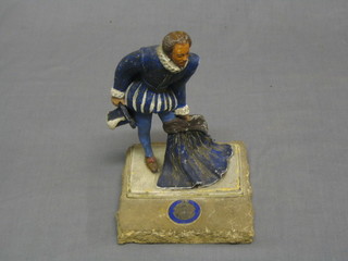 A painted spelter figure of a Francis Drake, raised on a section of stone removed from the bombe damaged Houses of Parliament