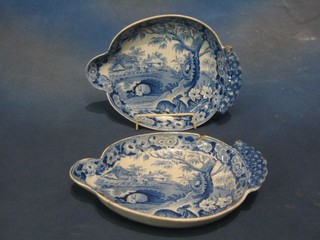 A pair of 19th Century blue and white pottery leaf shaped dishes decorated landscape, trees and rabbits 11" (some chips)