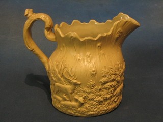 A 19th Century Turnerware style jug decorated a stag hunt 7"
