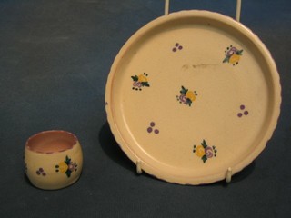 A Carter Stabler Adams Poole saucer with floral decoration 6 1/2" and a Poole egg cup