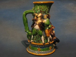 A 19th Century Majolica jug decorated dancing figure, the base marked Mintons 487 10"