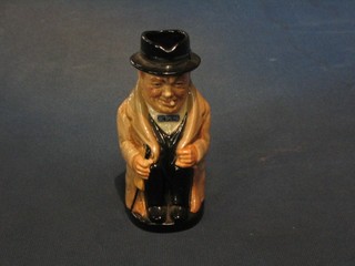 A Royal Doulton Toby jug in the form of Winston Churchill 5 1/2" (cigar f)