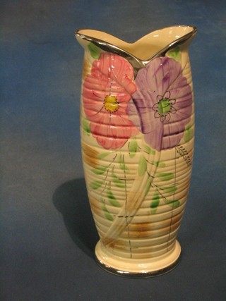 An Art Deco Arthur Wood pottery vase with floral decoration 12"