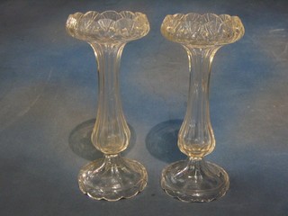A pair of circular glass pedestals 14"