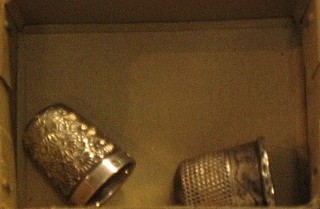 2 engraved silver thimbles
