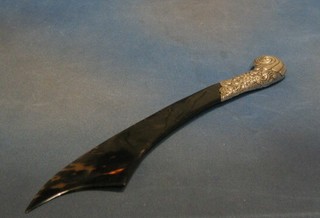 A Victorian tortoiseshell and silver mounted newspaper opener in the form of a scimitar London 1889