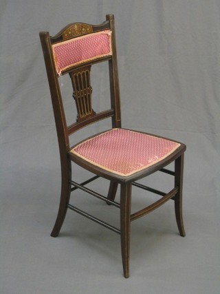 An Edwardian inlaid rosewood bedroom chair 