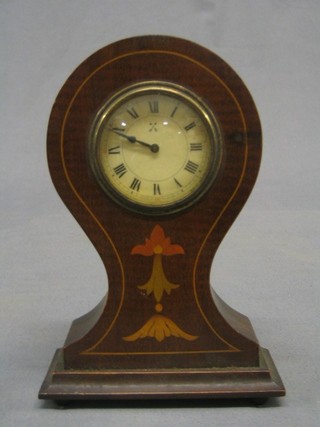 A bedroom timepiece contained in an inlaid mahogany balloon case 6"