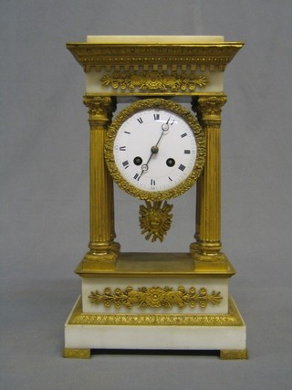 A 19th Century French 8 day striking Portico clock with porcelain dial and Roman numerals contained in a gilt ormolu and white marble case