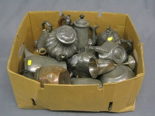A quantity of old pewter teapots (some damage)