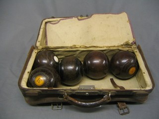 5 lignum vitae bowling woods contained in a Gladstone bag