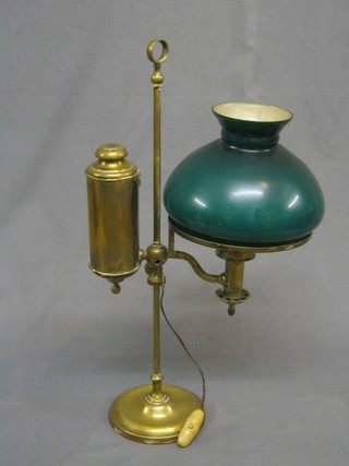 A 19th Century adjustable oil desk lamp, converted to electricity with green glass shade