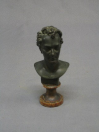 A 19th Century bronze head and shoulders portrait of Byron, raised on a marble base 6"