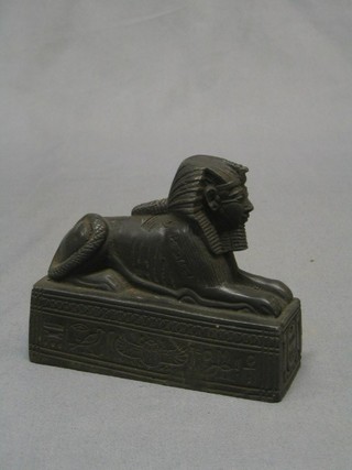 A 20th Century bronzed figure of a sphinx 5" (slight chip to base)