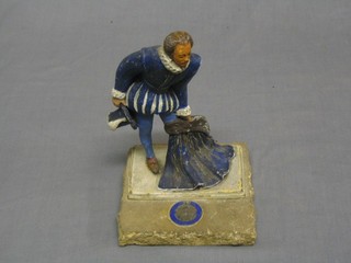 A painted spelter figure of a Francis Drake, raised on a section of stone removed from the bomb damaged Houses of Parliament