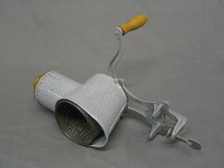 A grey enamelled Original J D A juicer/grinder 
