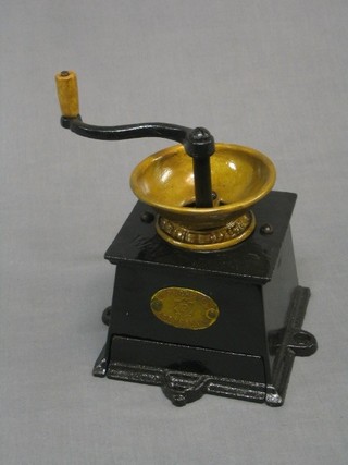 A 19th Century iron table mounted coffee grinder by E Pugh & Co 