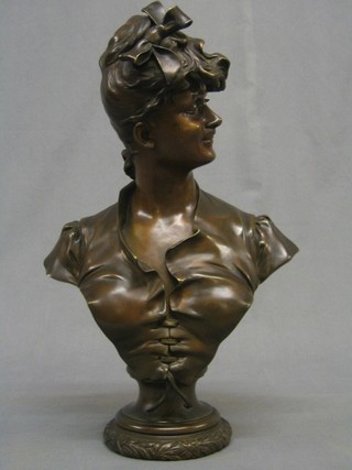 A Nelson, an Art Nouveau bronze head and shoulders portrait bust of a girl 18", raised on a bronze socle base