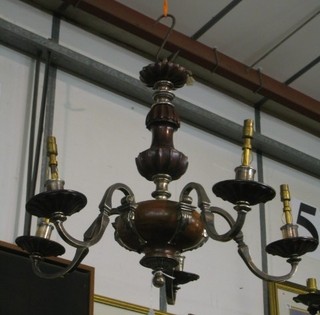 A handsome 1930's turned walnut and silver plated 5 light electrolier