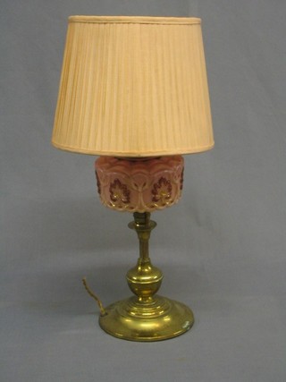 A 19th Century gilt metal pottery oil lamp converted to an electric table lamp