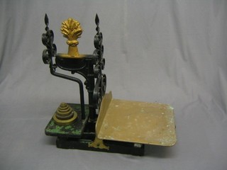 A pair of 19th Century platform scales with sheath of corn motifs, complete with weights