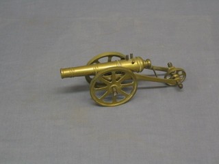 A 20th Century brass model of a canon with 7" barrel