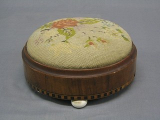 A Victorian circular walnut footstool with Berlin wool work seat 12"