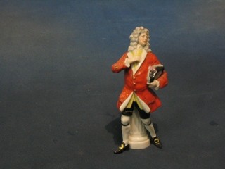 A Goebal? porcelain figure of a standing 18th Century gentleman by a pillar (leg f and r, base chipped), base with crown cypher mark 6"