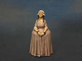 A Goebal? porcelain figure of a standing bonnetted lady in purple dress, the base with crown cypher mark 6"