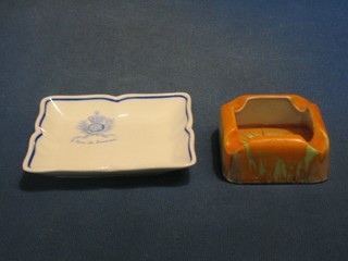A Shelley Art Deco ashtray with gilt, orange and stylised decoration 3" and a Royal Doulton ashtray 4"
