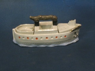 A pottery condiment set in the form of a ship marked Souvenir de Jersey, 7"