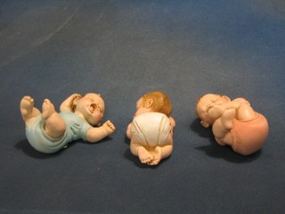 3 pottery figures of reclining babies 4" by A Luchein