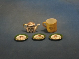 A Royal Worcester blush ground miniature mug 1", a Royal Doulton 1919 Derby style miniature teapot and 3 French miniature Doulton plates decorated portraits