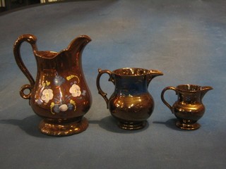 3 copper lustre jugs (1 chipped)