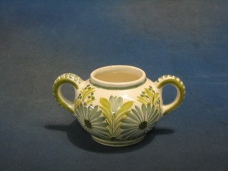 A Quimper green glazed twin handled sugar bowl, the base marked Quimper France F424D287R 4"