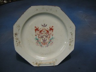 An 18th Century Oriental octagonal charger with armorial decoration 14" (rubbed)