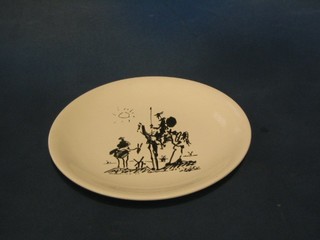 A Salins pottery plate decorated a Picasso scene of Don Quixote, the reverse with rubber stamp Picasso signature 9 1/2"