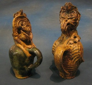 A pair of Ray Marshall pottery jugs in the form of birds 9" and 10"