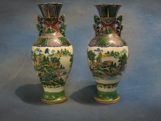 A pair of 19th Century Oriental twin handled vases decorated landscape 12" (1 with large chip to base)