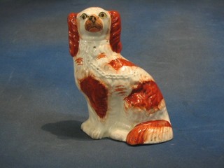 A Staffordshire figure of a seated Spaniel 10"