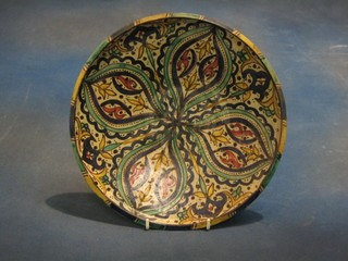 A circular Eastern pottery bowl 12"