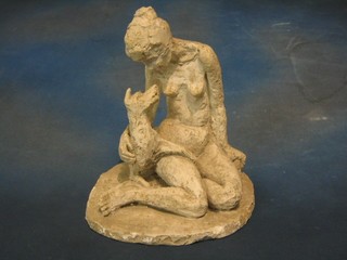 A plaster figure of a seated naked lady and dog 13"