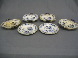 A 19th Century dessert service with twin handled square dishes with blue and gilt decoration, 2 oval dishes (1 with foot f) and 2 circular pottery plates