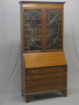 An Edwardian inlaid mahogany bureau bookcase the upper section with moulded cornice, the interior fitted adjustable shelves enclosed by an astragal glazed panelled door, the fall front revealing a well fitted interior above 4 long graduated drawers with brass swan neck drop handles, raised on bracket feet 37"