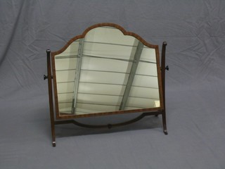 An Edwardian arched plate dressing table mirror contained in an inlaid mahogany frame (old break to front leg) 26"